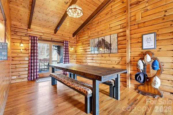 a view of a room with furniture window and wooden floor