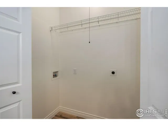 a view of small space with racks on the wall