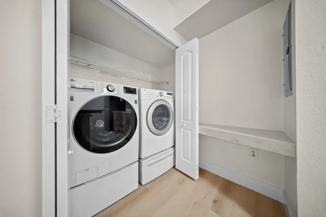 a utility room with dryer and washer