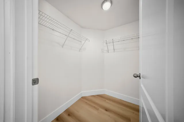 a view of a room with racks on the wall