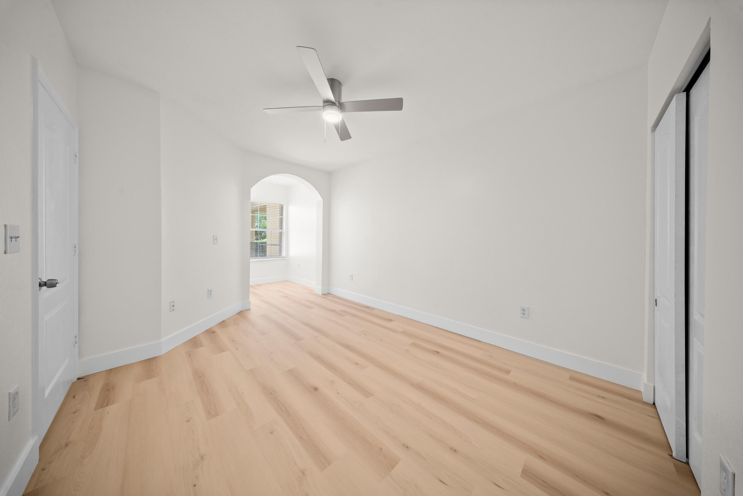 110 Southwest Peacock Boulevard, Unit 6102 Port St. Lucie, FL 34986 - Photo 22 of 40 a view of a big room with closet and windows