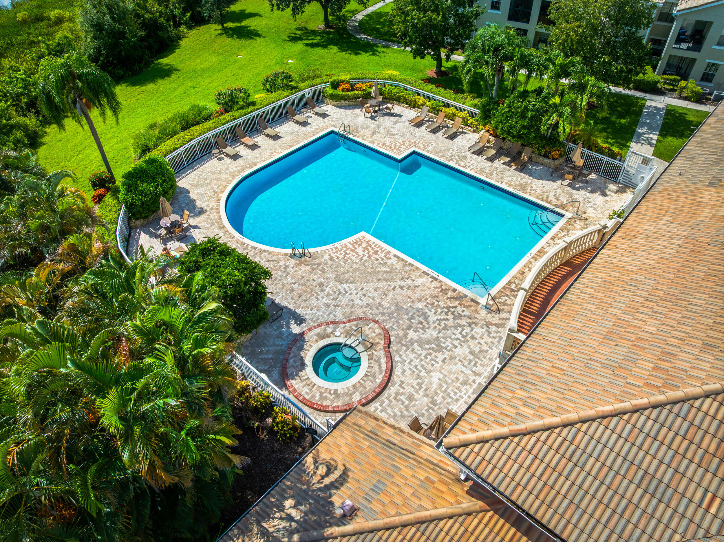 110 Southwest Peacock Boulevard, Unit 6102 Port St. Lucie, FL 34986 - Photo 27 of 40 a view of outdoor space yard and swimming pool