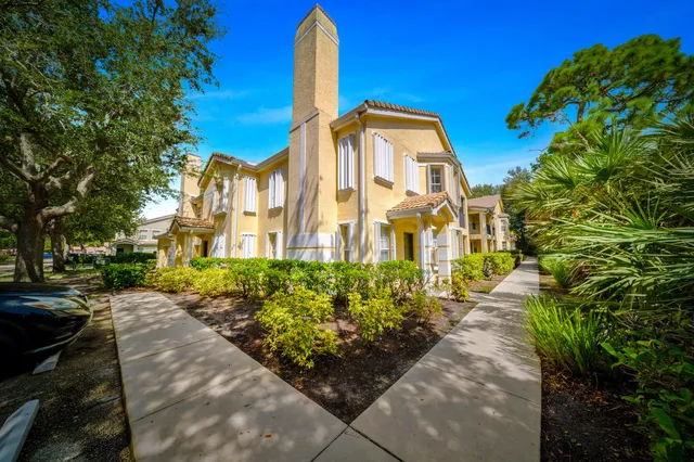 a view of a building with a garden