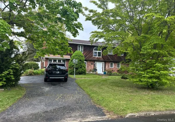 a house view with a garden space