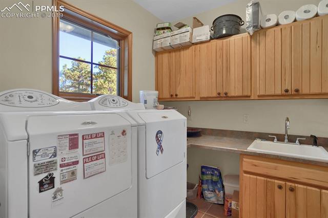 10980 Huntsman Road Colorado Springs, CO 80908 - Photo 14 of 35 main level laundry