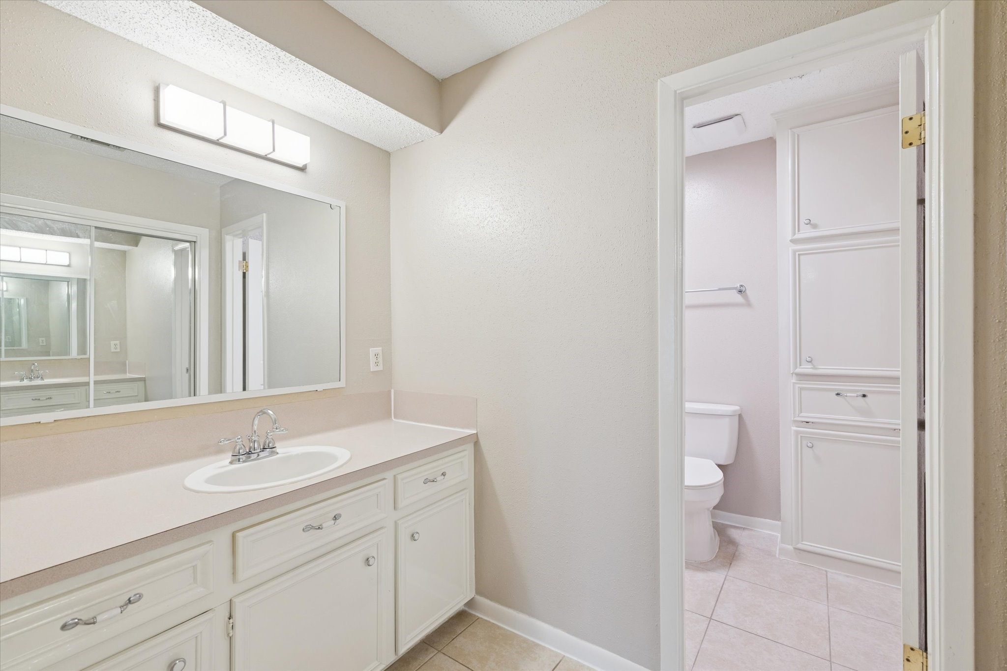 14722 Brown Road Tomball, TX 77377 - Photo 13 of 21 Primary bathroom featuring a large vanity and ample storage.