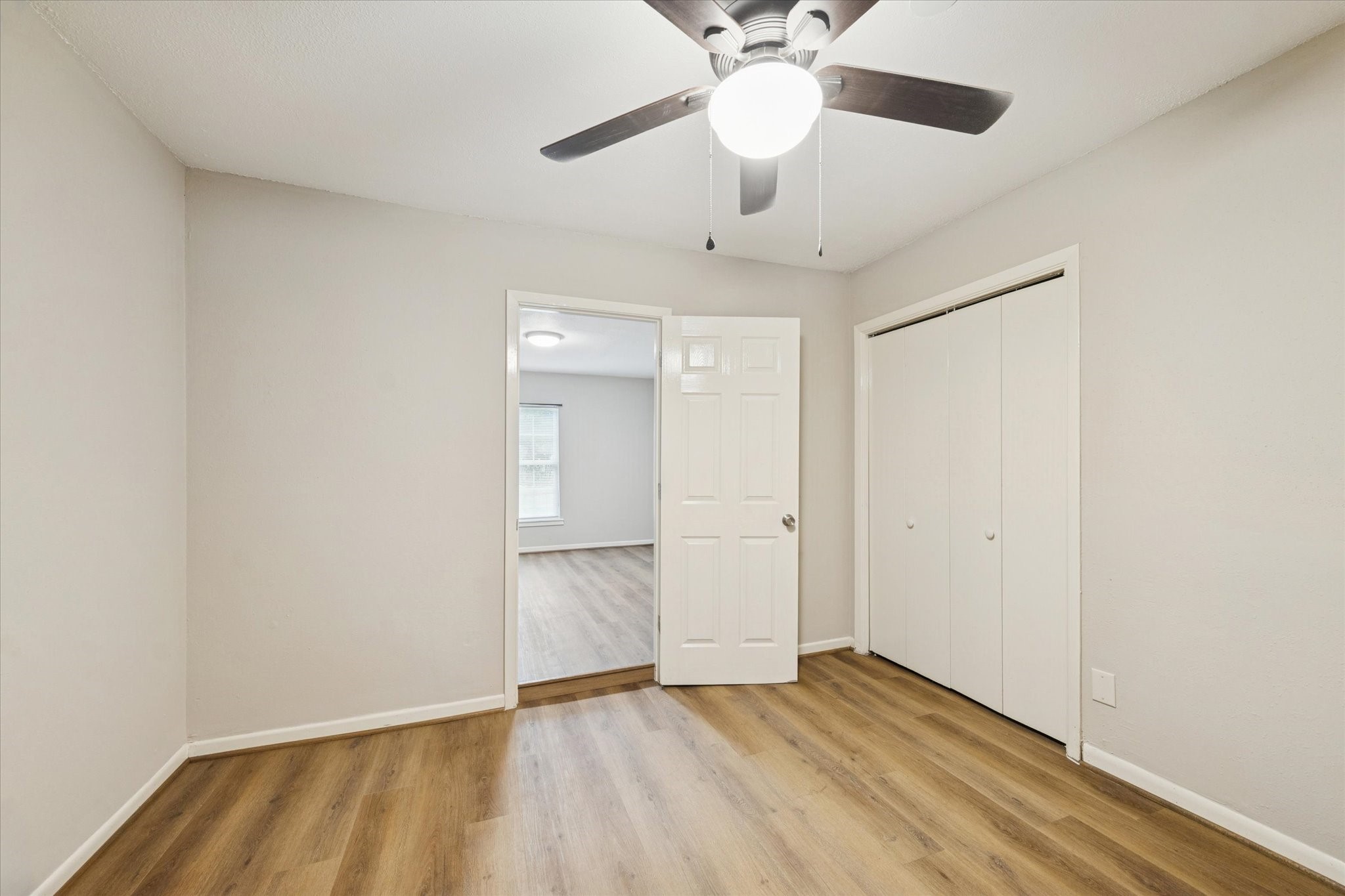 14722 Brown Road Tomball, TX 77377 - Photo 16 of 21 Bedroom three with laminate flooring and fresh paint.
