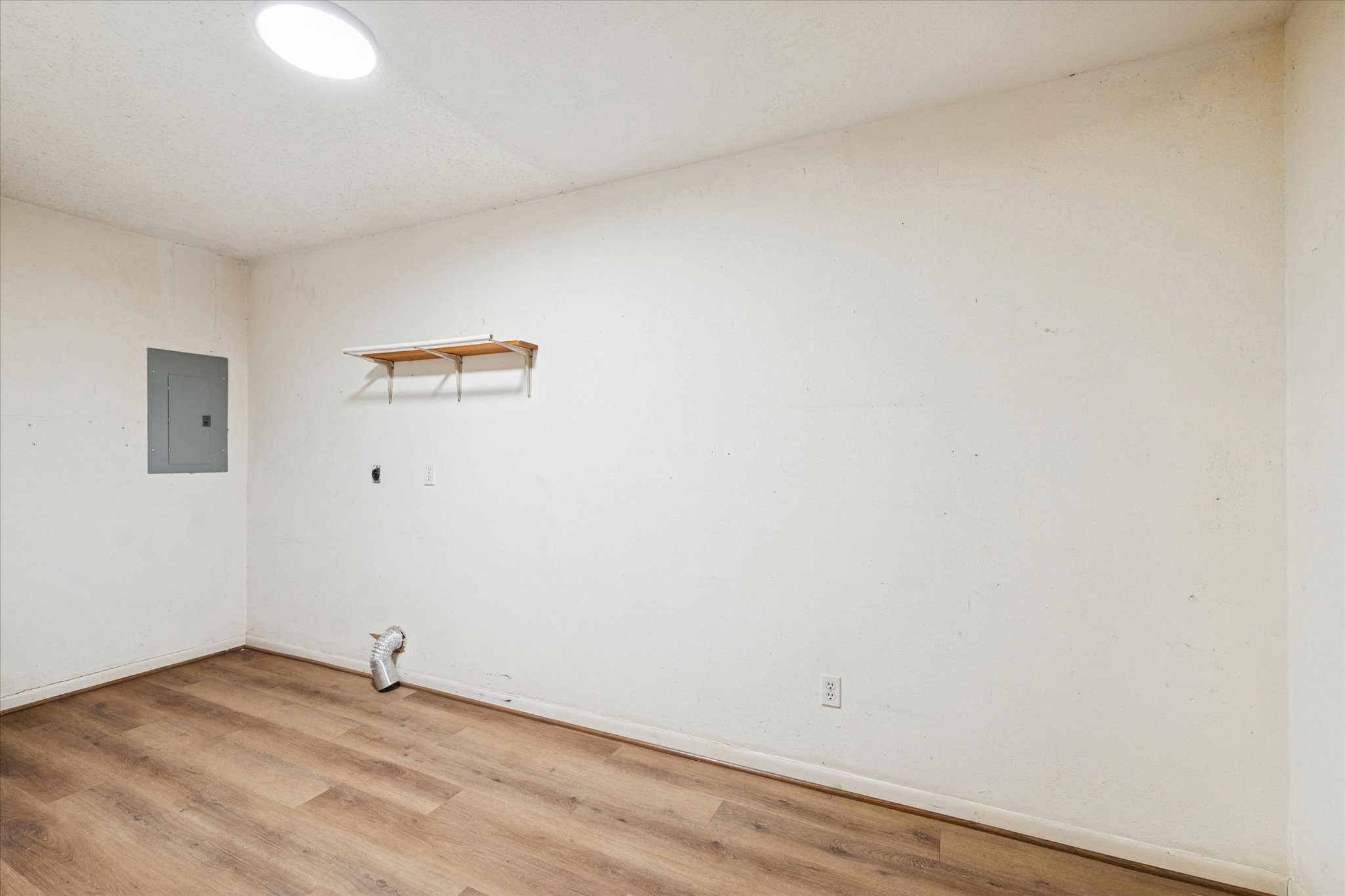 14722 Brown Road Tomball, TX 77377 - Photo 20 of 21 Oversized utility room with space for washer and dryer plus additional pantry or storage.