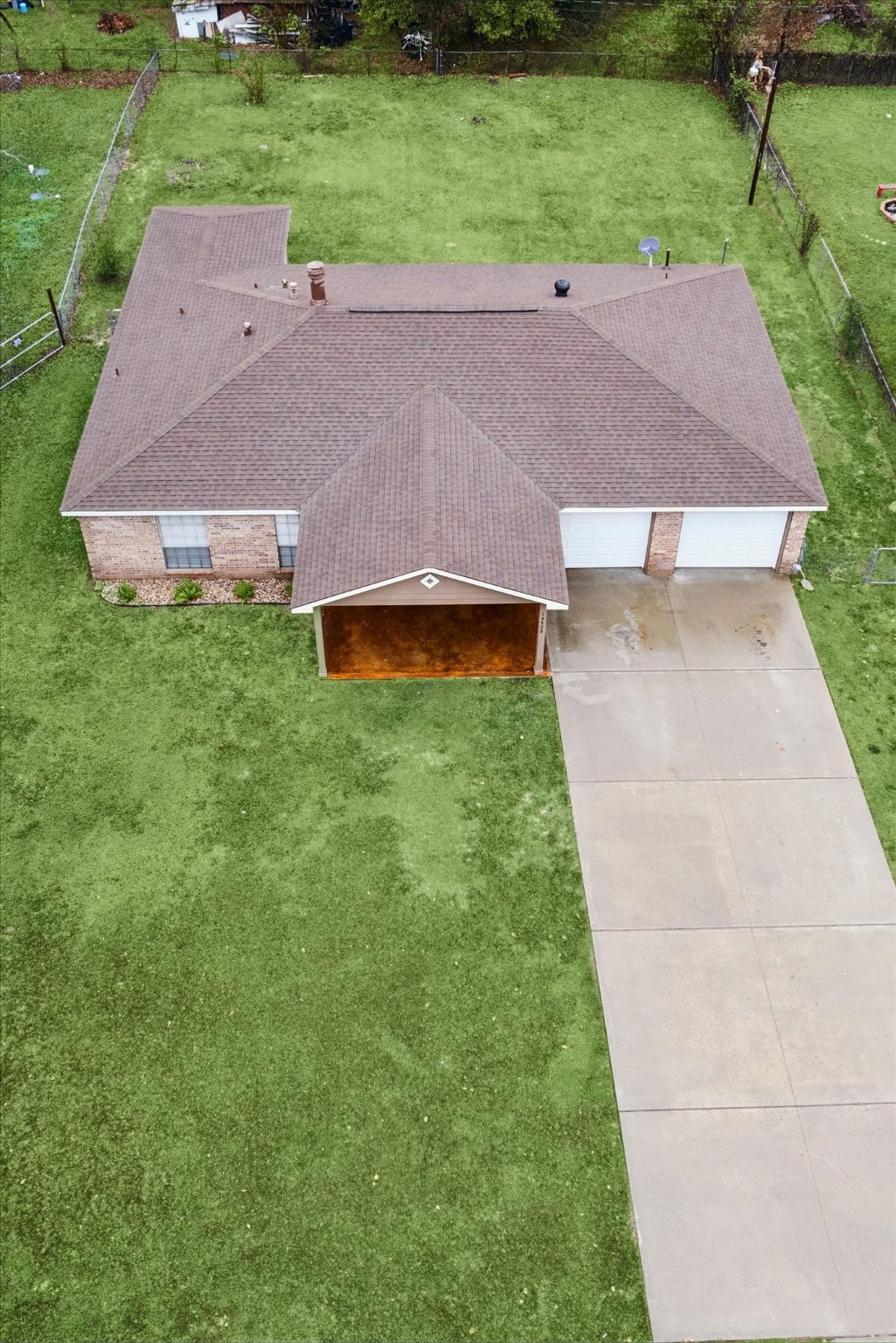 14722 Brown Road Tomball, TX 77377 - Photo 2 of 21 Aerial view highlighting the expansive front and backyard space and extended driveway.