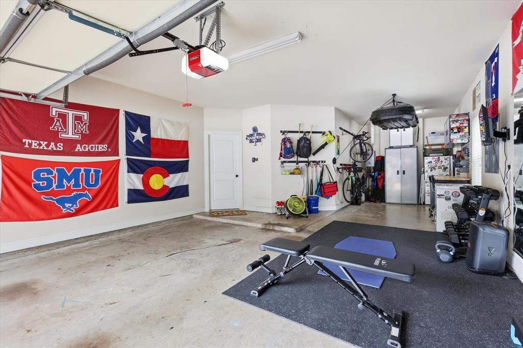 944 Spring Creek Drive Grapevine, TX 76051 - Photo 36 of 37 A 3 Car Tandem Garage. Seller use extra space as a workshop area.
