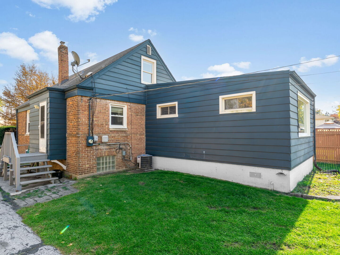 17816 Commercial Avenue Lansing, IL 60438 - Photo 15 of 17 a front view of a house with a yard