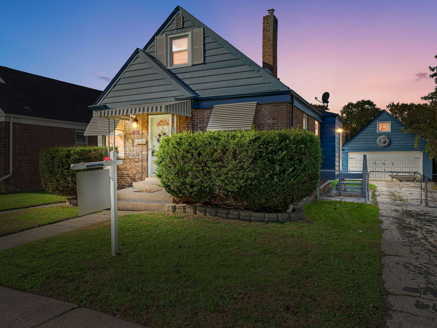 17816 Commercial Avenue Lansing, IL 60438 - Photo 2 of 17 a front view of a house with a yard