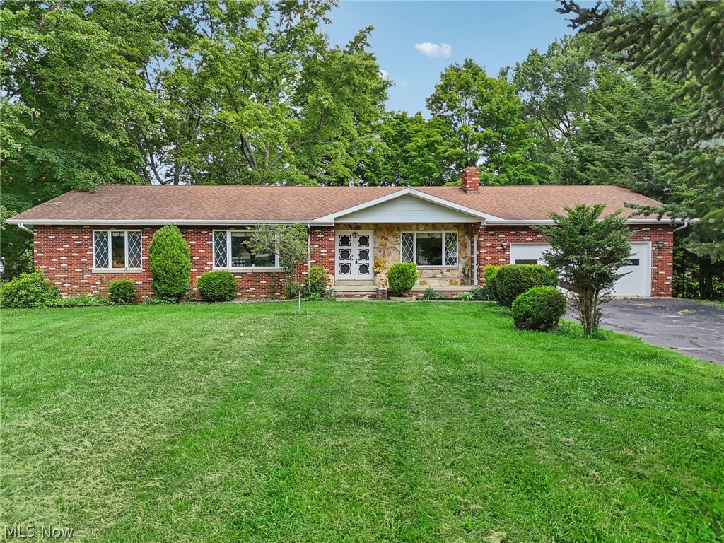 2919 South Ridge Road East Ashtabula, OH 44004 - Photo 1 of 50 Ranch-style house with a garage and a front lawn