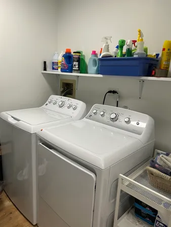 a utility room with dryer and washer
