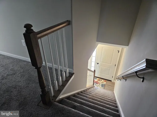 a view of an entryway with staircase