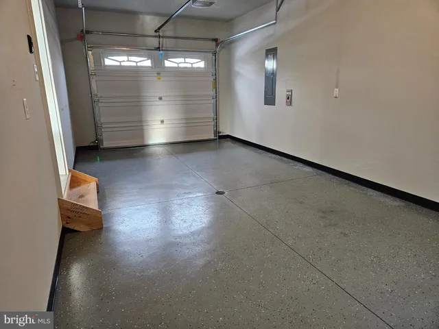 a view of empty room with windows