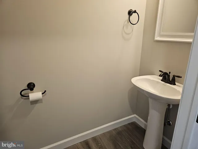 a bathroom with a sink and vanity