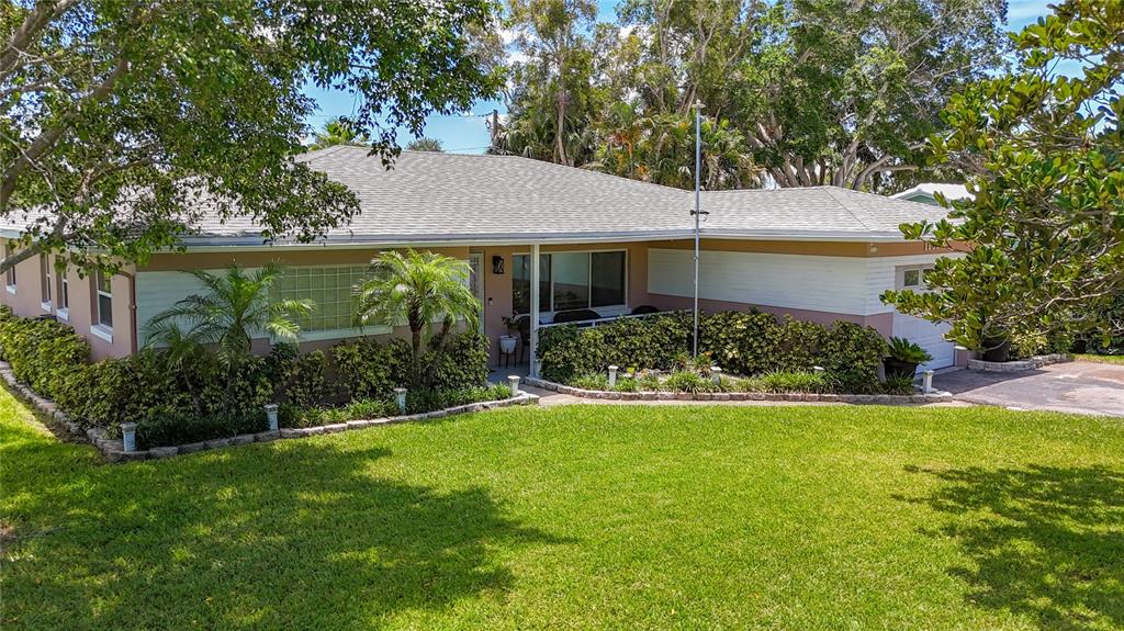 1137 Indian Rocks Road Largo, FL 33770 - Photo 1 of 1 a view of front of house with a yard