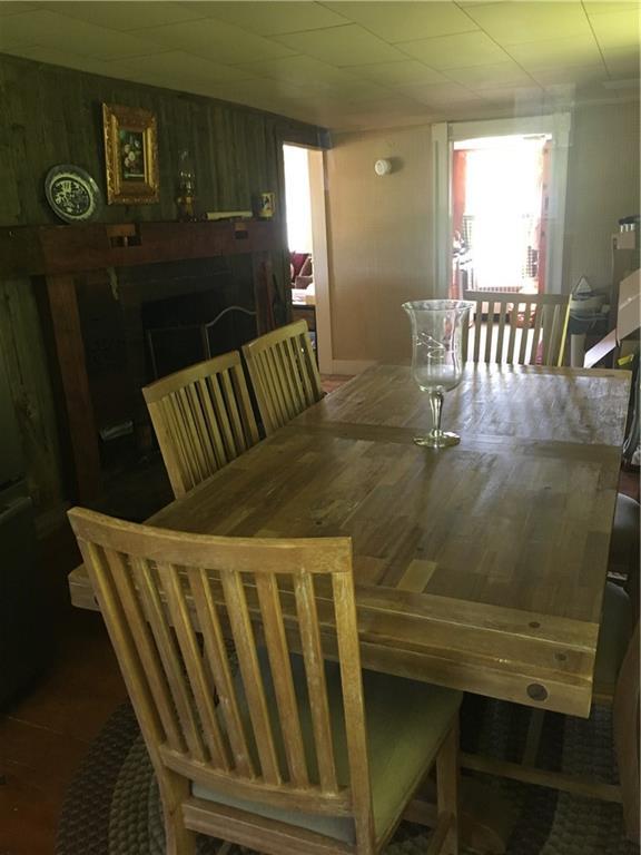 411 Ellis River Road Rumford, ME 04276 - Photo 7 of 26 Dining room with grand fireplace