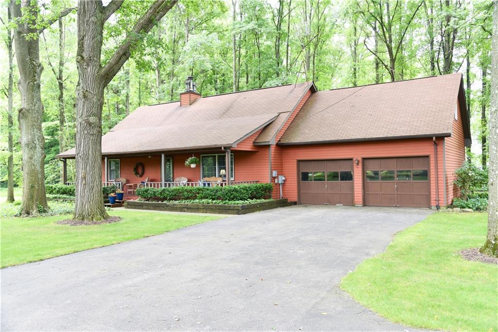 Spend your summer on this beautiful spacious front porch.  This large 3/4 bedroom cap cod has a beautiful wooded lot.  