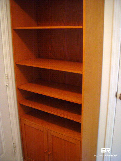 16752 Sugar Loop Foley, AL 36535 - Photo 12 of 34 Shelves in laundry