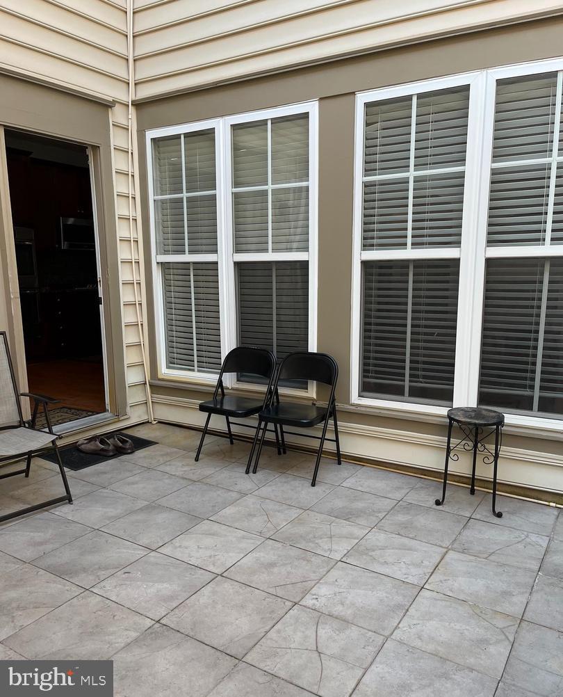9163 Stone Garden Lorton, VA 22079 - Photo 9 of 25 a view of a room with chairs