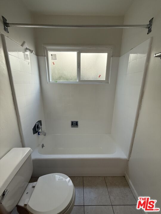 5719 Tilden Avenue, Unit A Sherman Oaks, CA 91401 - Photo 6 of 11 a bathroom with a toilet and a shower