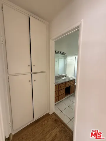a kitchen with a stove a sink and a refrigerator