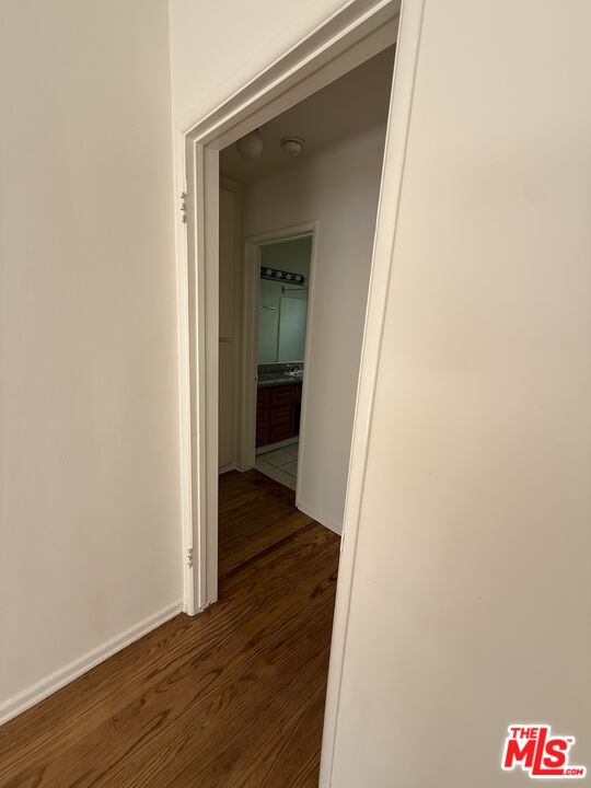 5719 Tilden Avenue, Unit A Sherman Oaks, CA 91401 - Photo 8 of 11 a view of a hallway with wooden floor