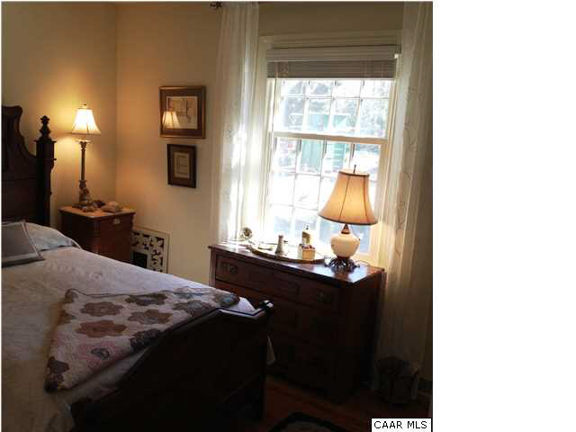 1828 Westview Road Charlottesville, VA 22903 - Photo 14 of 22 a bedroom with a bed and a window