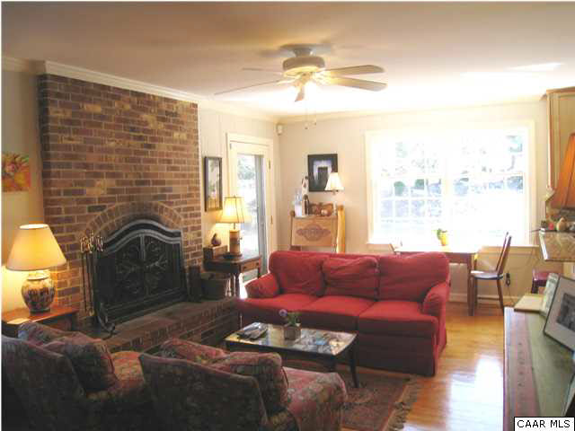 1828 Westview Road Charlottesville, VA 22903 - Photo 4 of 22 a living room with furniture fireplace and a table