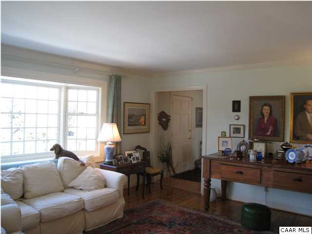 1828 Westview Road Charlottesville, VA 22903 - Photo 6 of 22 a living room with furniture flat screen tv and window