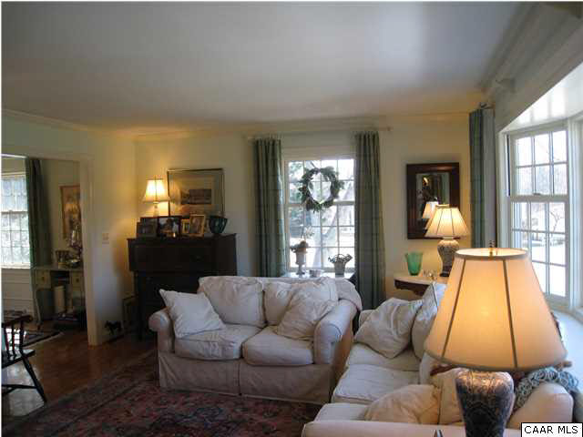 1828 Westview Road Charlottesville, VA 22903 - Photo 7 of 22 a living room with furniture and a lamp