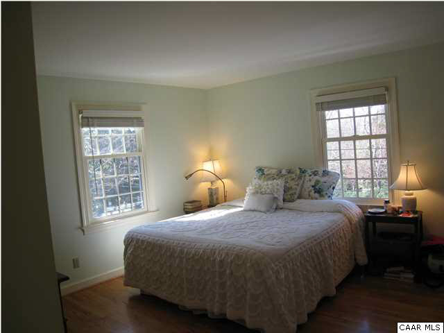 1828 Westview Road Charlottesville, VA 22903 - Photo 10 of 22 a bedroom with a bed and a window