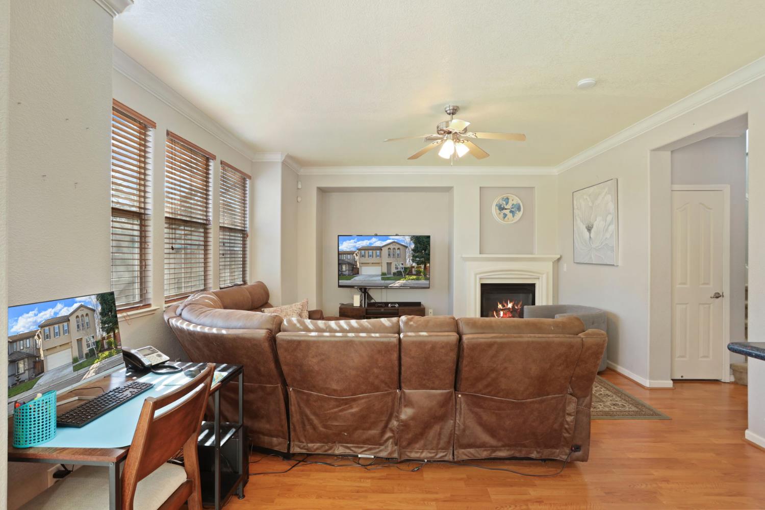 3144 Sweet Lilac Way Stockton, CA 95209 - Photo 19 of 76 a living room with fireplace furniture and a large window
