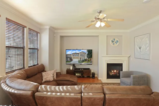 a kitchen with stainless steel appliances granite countertop a sink refrigerator and microwave