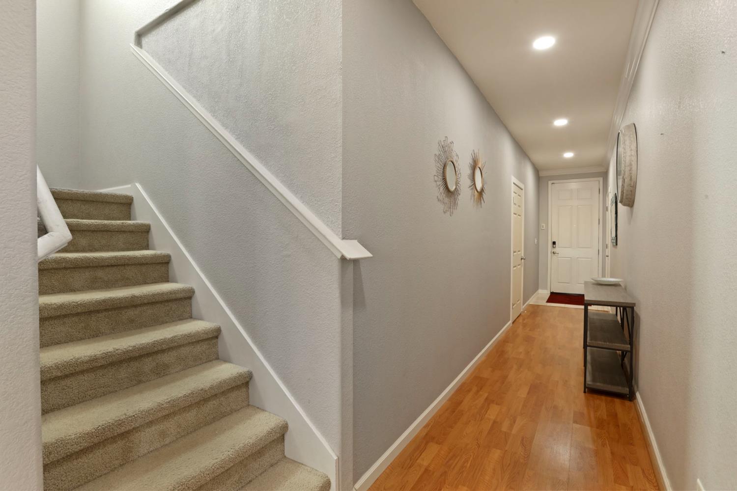 3144 Sweet Lilac Way Stockton, CA 95209 - Photo 31 of 76 a view of a hallway with staircase
