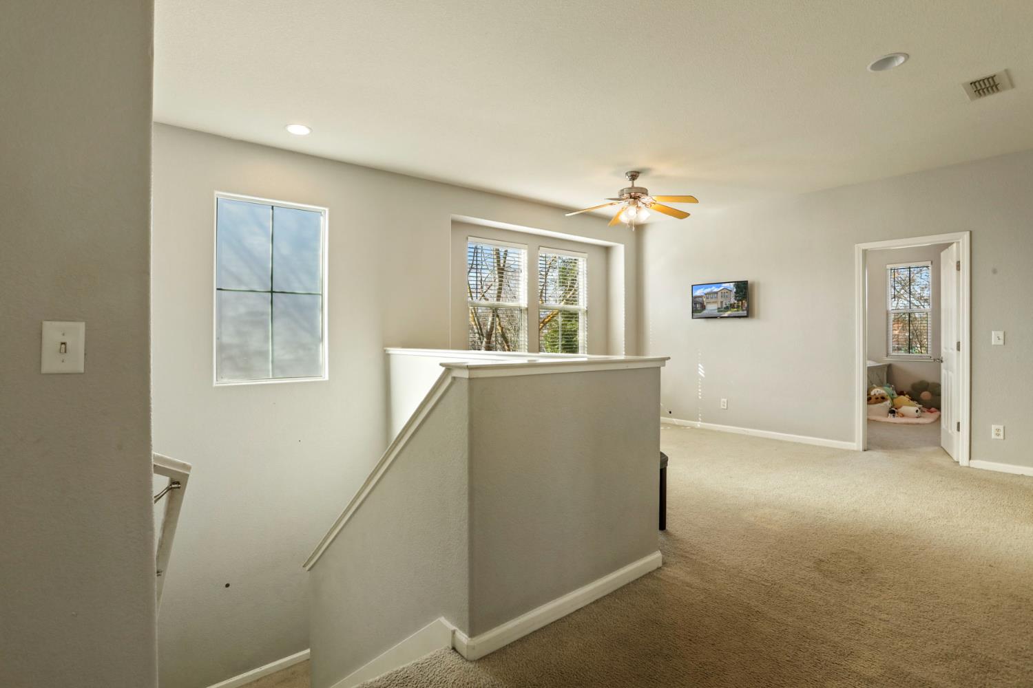 3144 Sweet Lilac Way Stockton, CA 95209 - Photo 32 of 76 a view of a livingroom with furniture and windows