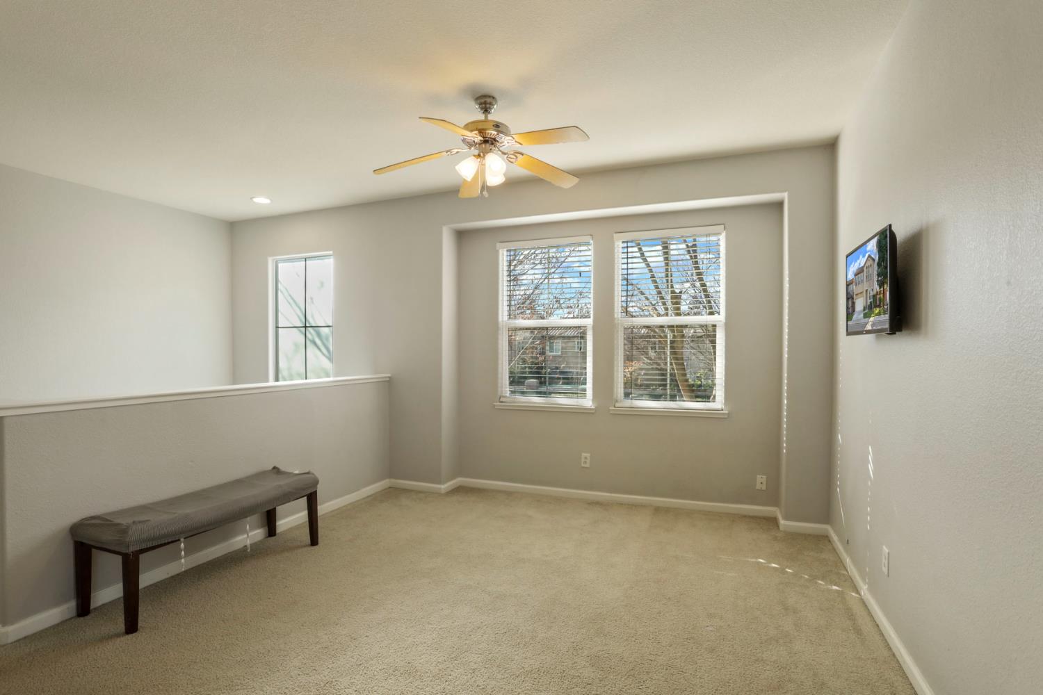 3144 Sweet Lilac Way Stockton, CA 95209 - Photo 33 of 76 a view of room with window and ceiling fan