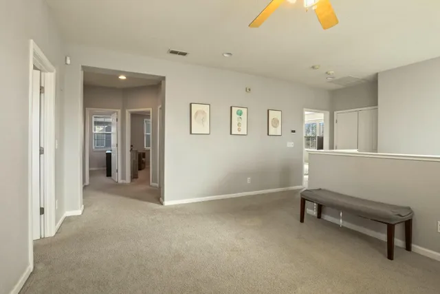 a bathroom with a granite countertop sink a shower and a bathtub