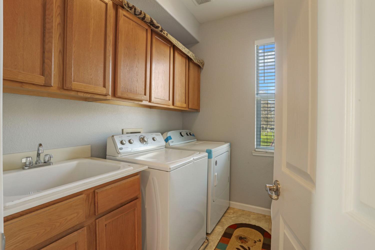 3144 Sweet Lilac Way Stockton, CA 95209 - Photo 43 of 76 a utility room with dryer and washer