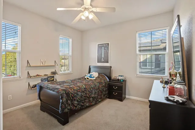 a swimming pool with wooden fence