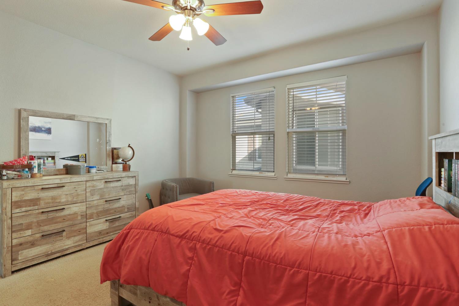 3144 Sweet Lilac Way Stockton, CA 95209 - Photo 47 of 76 a bedroom with a bed and a dresser