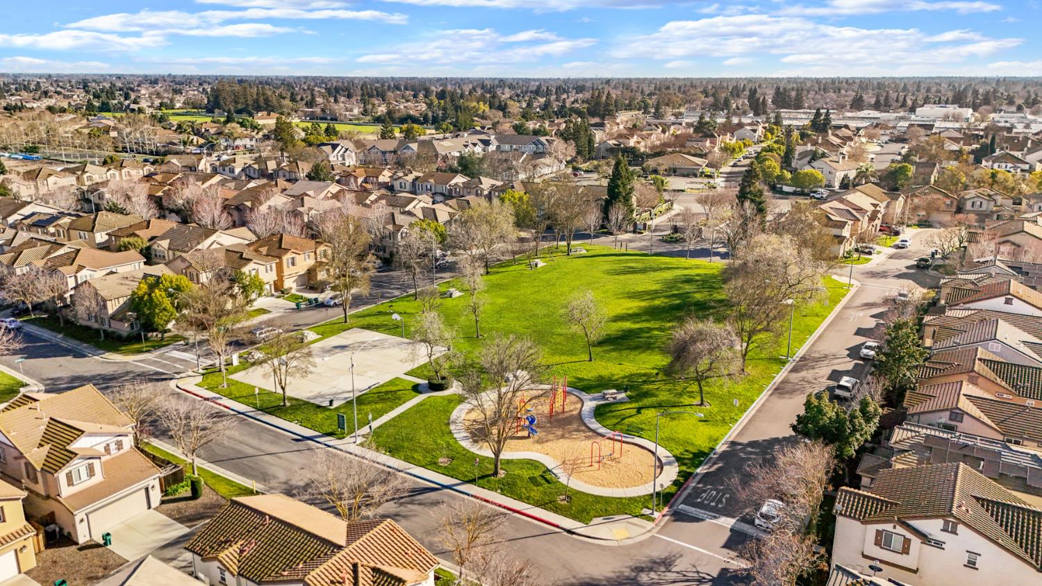 3144 Sweet Lilac Way Stockton, CA 95209 - Photo 66 of 76 an aerial view of residential houses with outdoor space