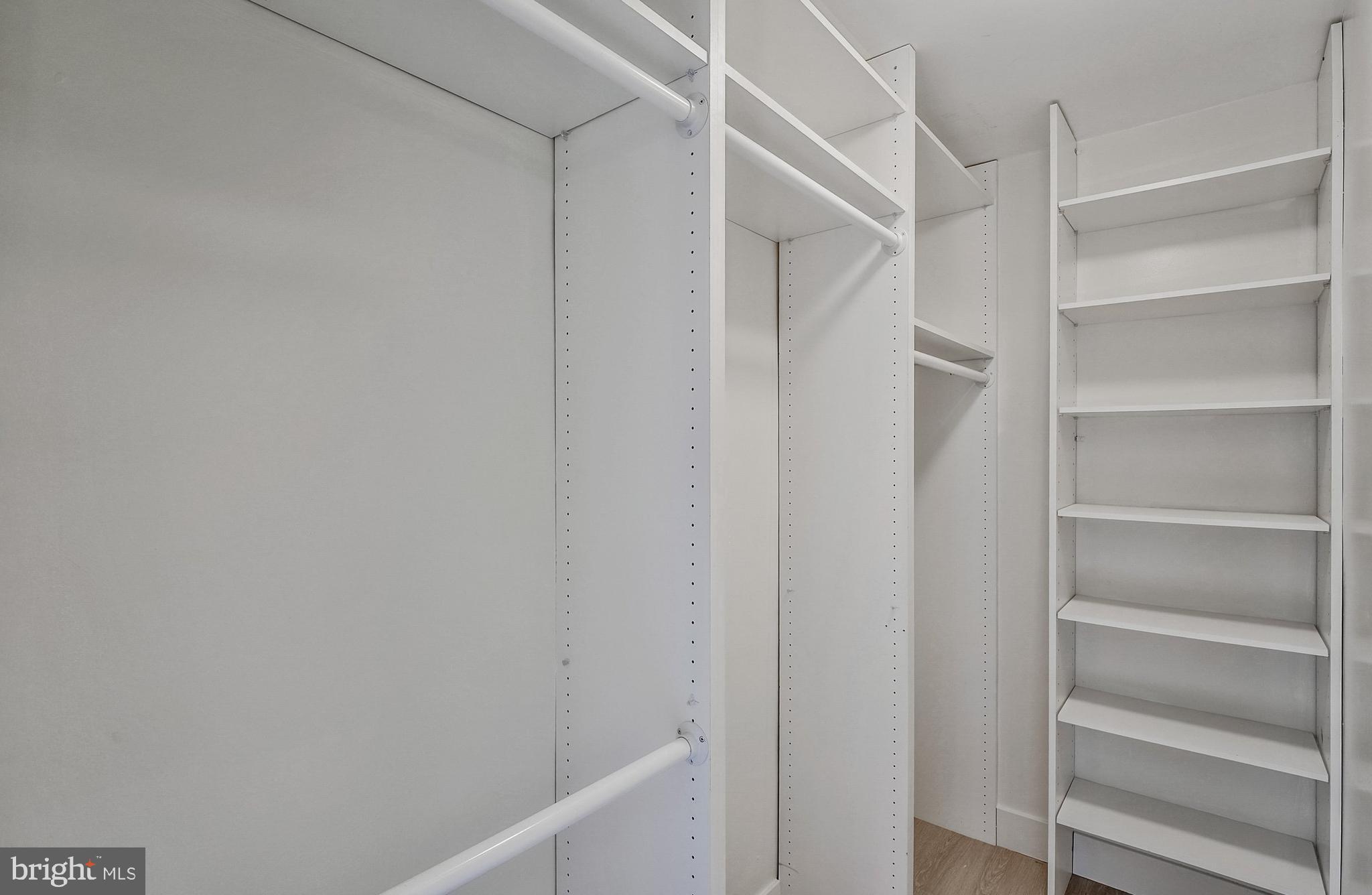 5101 River Road, Unit 618 Bethesda, MD 20816 - Photo 22 of 46 a view of walk in closet with empty racks