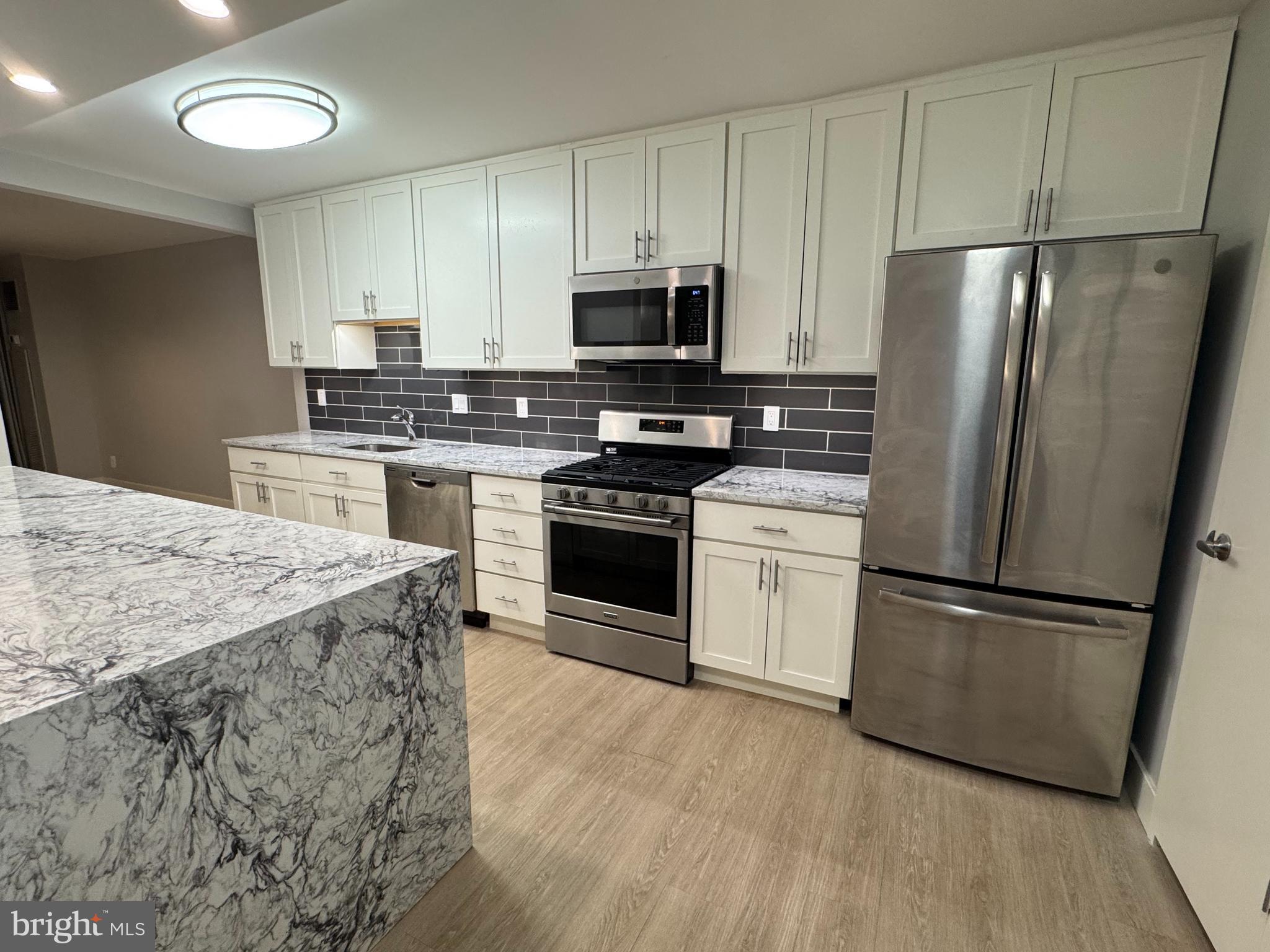 5101 River Road, Unit 618 Bethesda, MD 20816 - Photo 7 of 34 OPEN KITCHEN