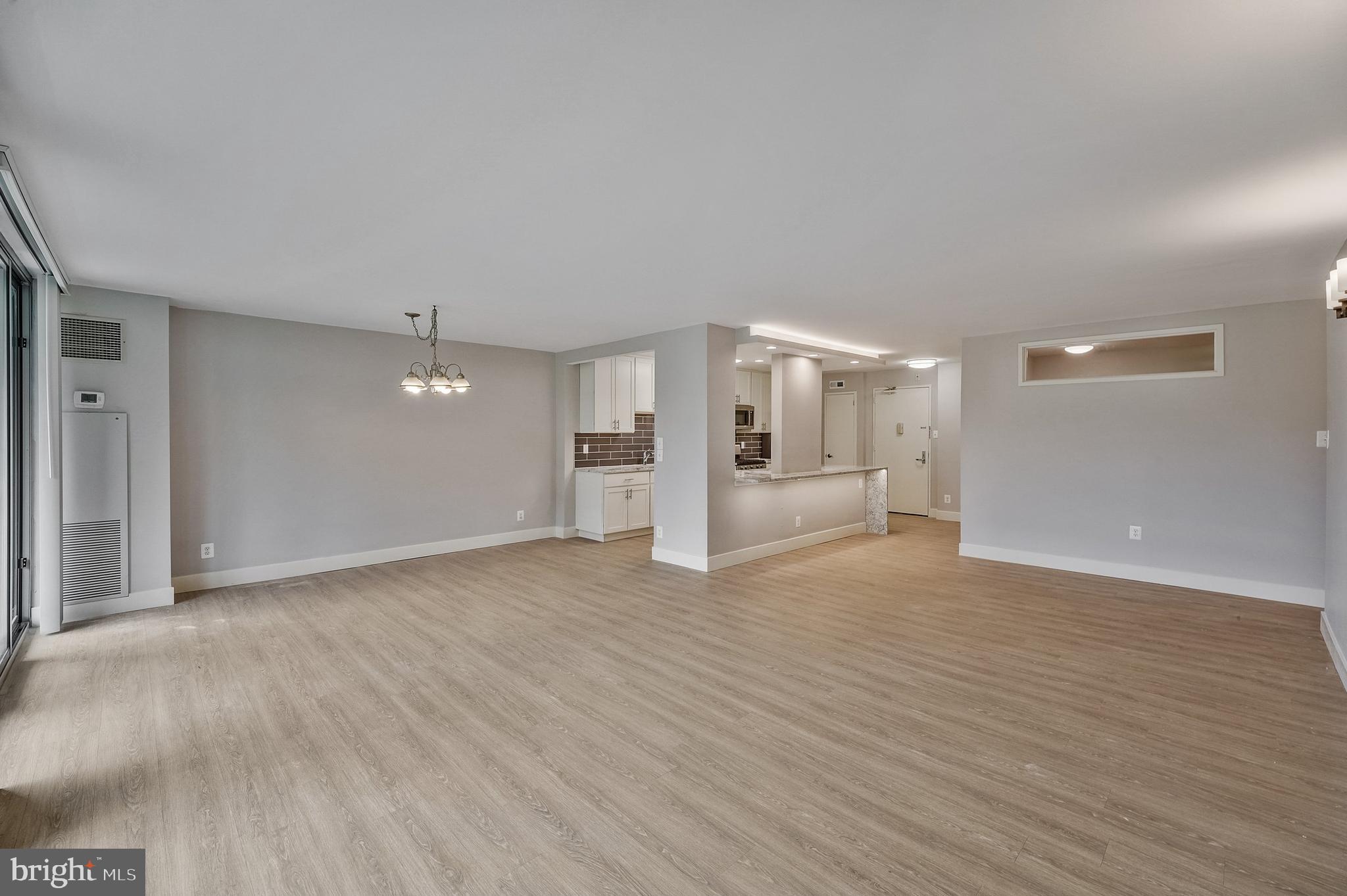 5101 River Road, Unit 618 Bethesda, MD 20816 - Photo 9 of 46 a view of empty room with wooden floor