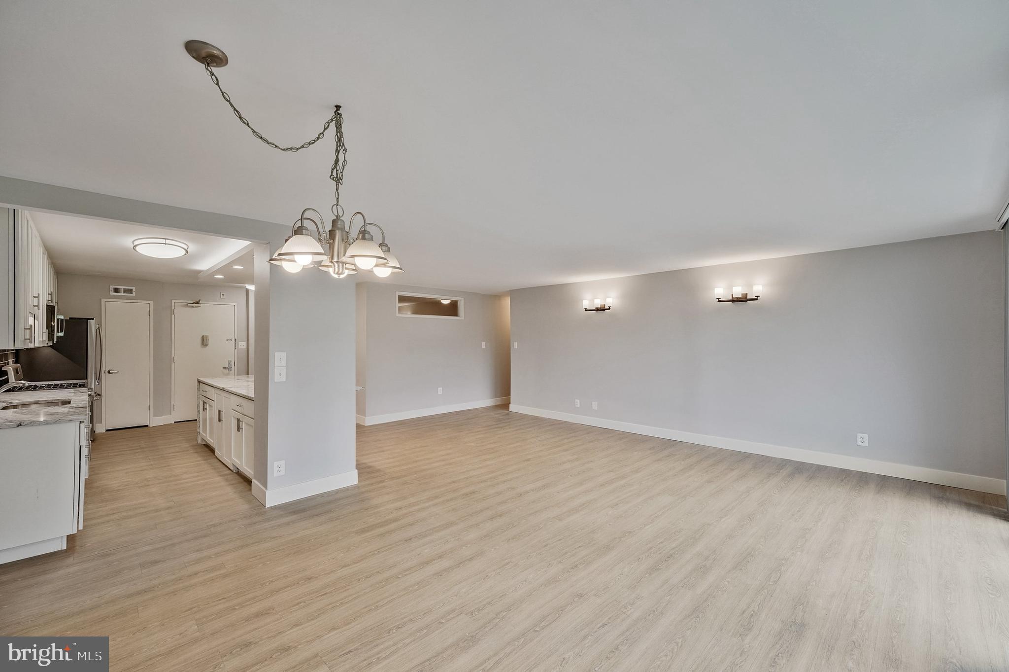 5101 River Road, Unit 618 Bethesda, MD 20816 - Photo 10 of 46 a view of a chandelier in a room