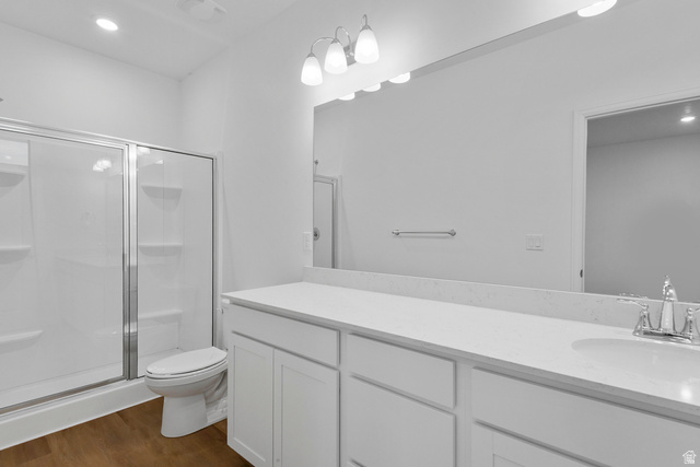 1302 East 1670th North, Unit 908 Payson, UT 84651 - Photo 17 of 21 Full bathroom with a shower stall, recessed lighting, vanity, and dark wood-type flooring