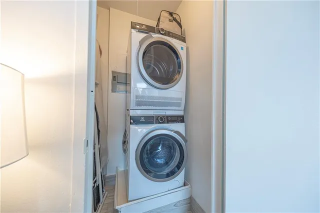 a view of parking garage with cars